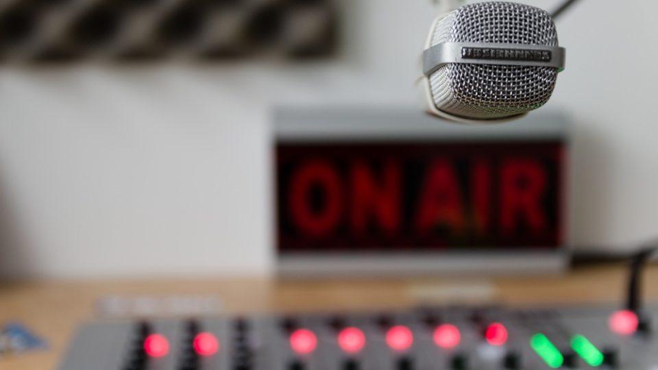 Radio-studio-microphone-mixer-background